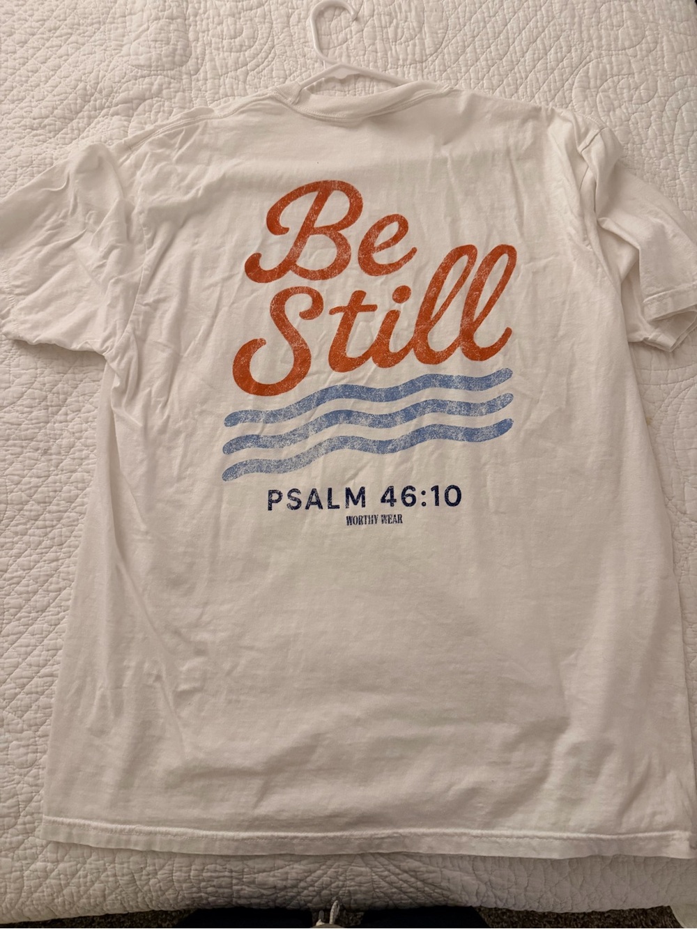 Be Still Psalm 46:10 White Tee with Orange & Blue Graphic
